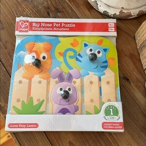 Hape Chunky big nose pet chunky 
wooden puzzle NWT